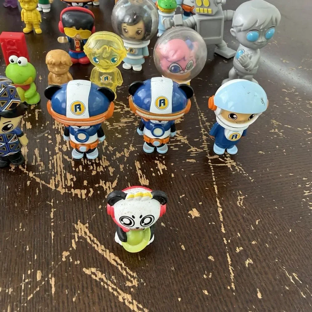 Ryan’s World Figures Lot 58 Pieces Red Titan Pandas Robots Helmet Astronauts